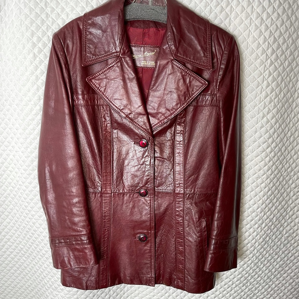 Vintage Early ‘70’s 100% Leather Coat. Maroon. Excellent condition. It’s Fly!